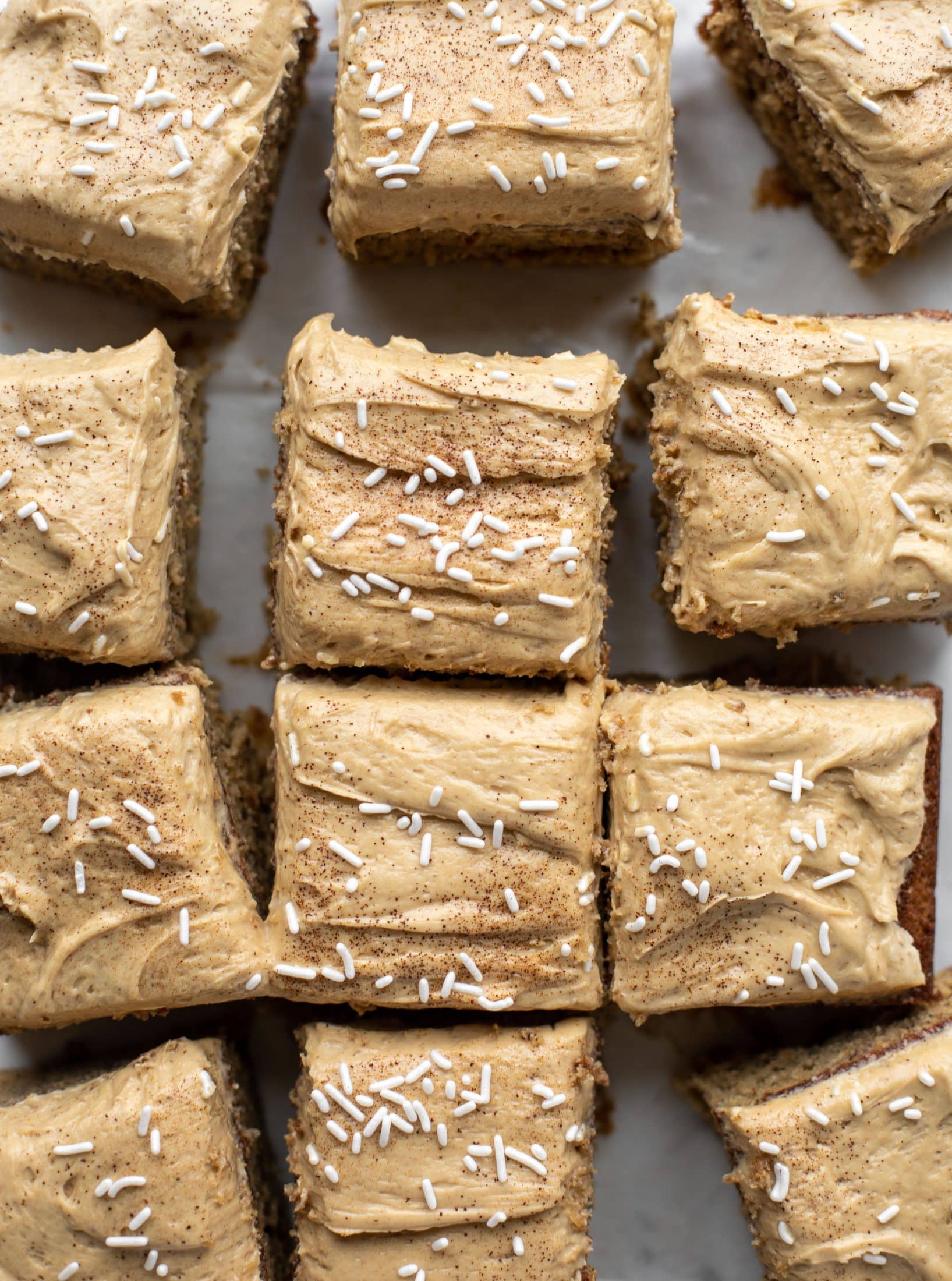 This banana cake is a delicious twist on banana bread! Covered with coffee cream cheese frosting, it’s an easy and wonderful treat.