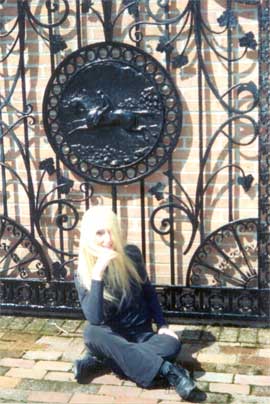 Lyn in front of the horse gate at the Horse Museum