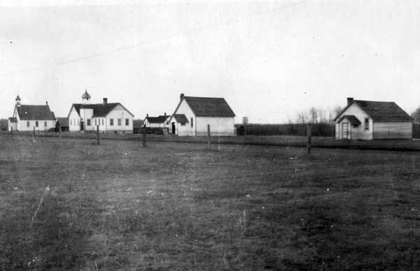 The Arden School consisted of the three building to the right of the church at left