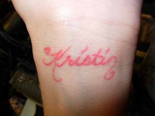 Pink ink tattoo