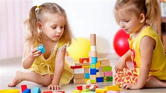 Image result for Babies Playing with Wooden Toys