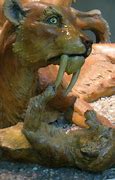 Image result for Smilodon