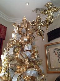 Image result for Quirky Christmas Tree Toppers