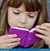 Image result for Picture of a Child Reading a Book