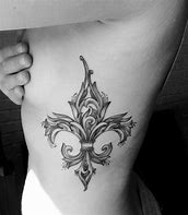 Image result for Fleur De Lis Finger Tattoo