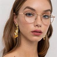 Image result for Oval Frame Gold Sunglasses