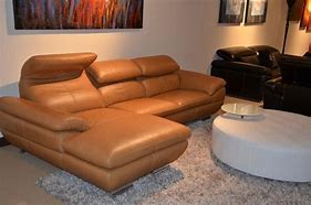 Image result for Camel Leather Sofa with Black and White Design