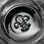 Image result for A Fleur De Lis Inside of a Metal Circle