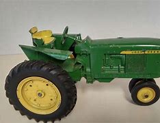 Image result for Old 1 16 John Deere Toy Tractors