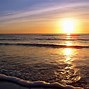 Image result for sunset with sun beach