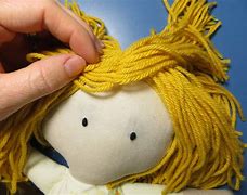 Image result for Mirmaid Toy Doll Yarn Hair in a Bun