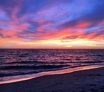 Image result for sunset with sun beach