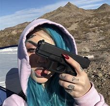 Image result for Holding Gun PFP