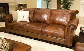 Image result for Camel Leather Sofa with Black and White Design