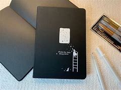 Image result for Black Paper Notebook