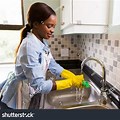 African American Woman Doing Chores