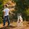 Boy Walking with Dog