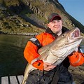 Fisherman Holding Fish