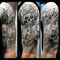 Half Sleeve Skull Tattoo Designs