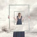 Surreal Woman Holding Frame