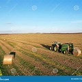 Tractor in a Hay Field Baler