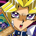 Yugi Holding Up Card