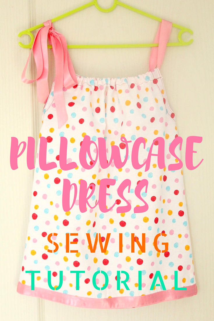 Pillowcase dress in polka dots with pink ribbon ties