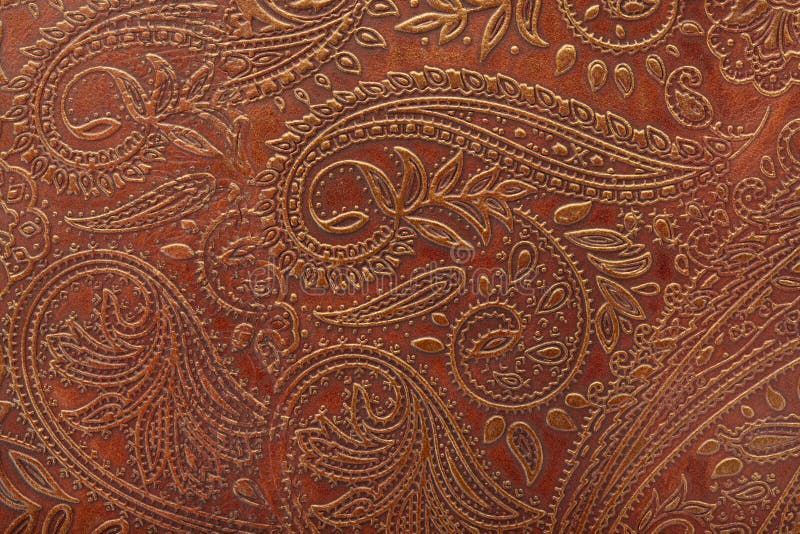 Floral pattern in brown leather