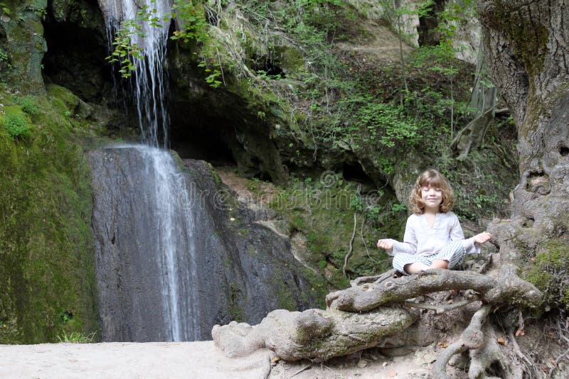 Little girl meditate