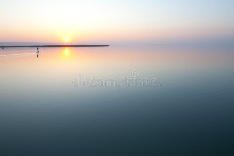 Sunset over calm lake