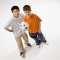 Friends holding soccer ball