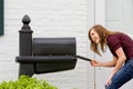 Girl Checking for Mail