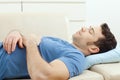 Man sleeping on couch