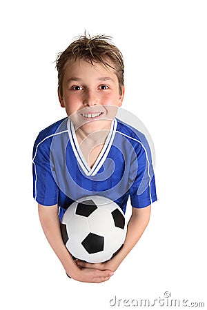 Boy holding soccer ball Stock Photo