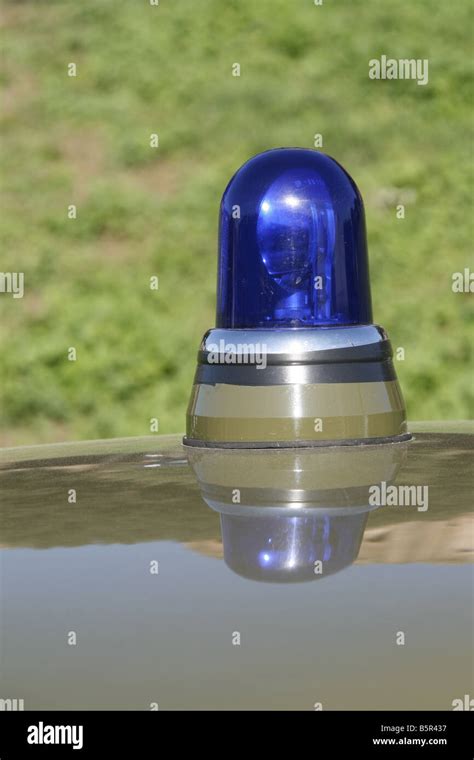 Detail Of One Blue Siren Light On Police Car Roof Stock Photo Alamy