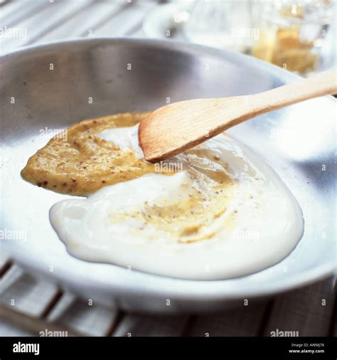 Making mustard creme fraiche sauce, close-up Stock Photo: 5423735 - Alamy