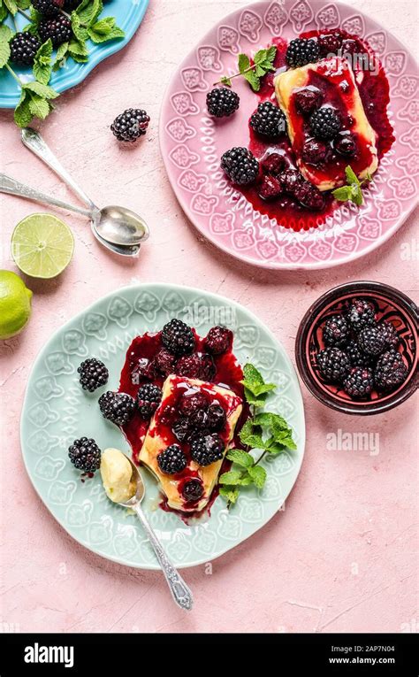 Creme Caramel with lime and red berries Stock Photo - Alamy