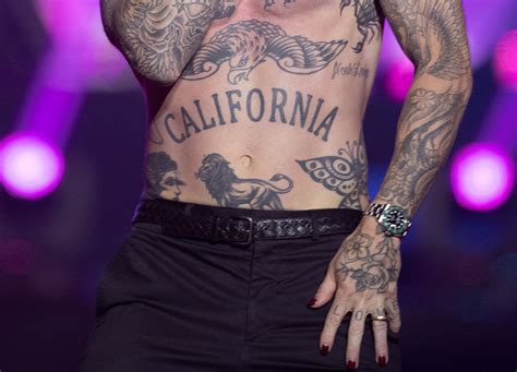 Adam Levine's most famous tattoos and their meanings