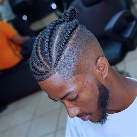 Two Braids With Fade Black Men - A man bun fade is a men's hairstyle that blends two hairstyles ...