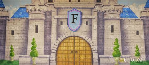 a painting of a castle with the letter f painted on it's front door