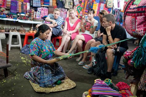 Traditional Guatemalan Clothing Demonstration in Antigua • Choosing Figs