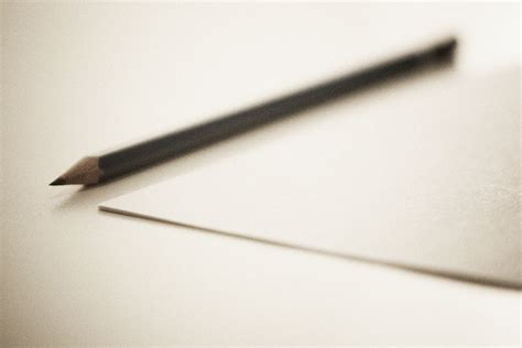 File:Sharpened pencil next to sheet paper.jpg - Wikimedia Commons