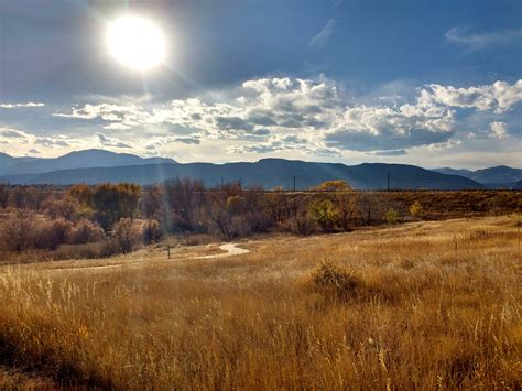 Autumn Sun over Prairie and Mountain Landscape – Photos Public Domain