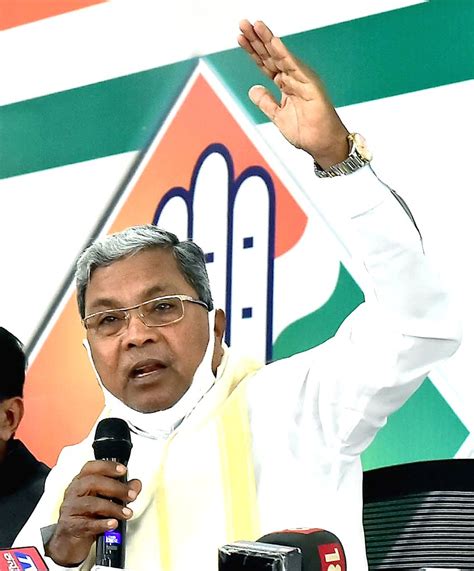 Congress leader Siddaramaiah addresses during a press conference