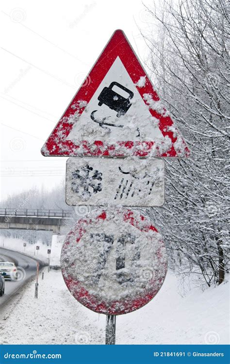 Snowy road signs stock image. Image of december, dirty - 21841691