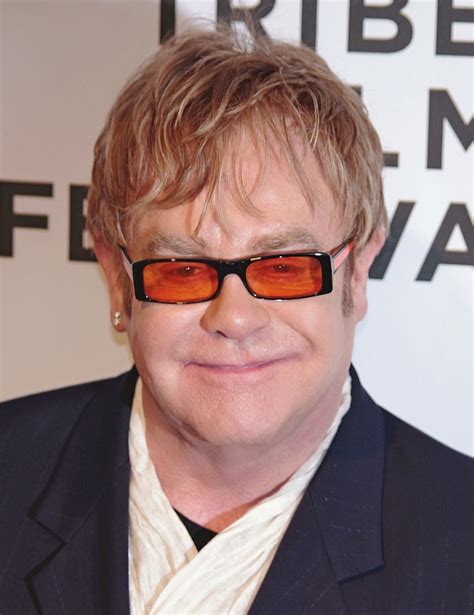 Elton John 2020: Husband, net worth, tattoos, smoking & body facts - Taddlr