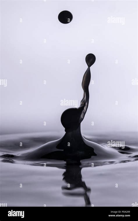 Waterdrop photography creating splash art Stock Photo - Alamy