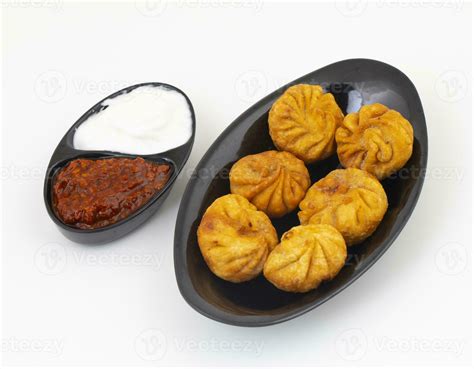 Fried Momos is a Traditional Dumpling Food From Nepal 35247043 Stock Photo at Vecteezy