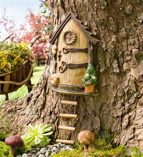 Feentür aus Keramik am Baumstamm | Diy feengarten, Märchenbaumhäuser, Märchenbaum