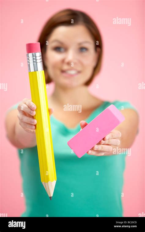 Holding large pencil hi-res stock photography and images - Alamy